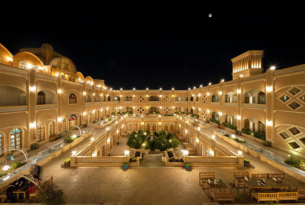 Historic Hotel Dad in Yazd showcasing a restored traditional mansion, beautiful courtyard, and Persian architectural details