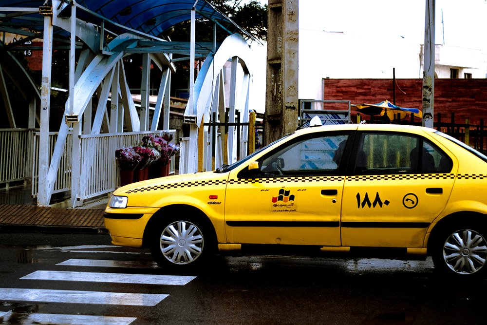 Tehran yellow cabin taxi models shows at Tehran travel guide